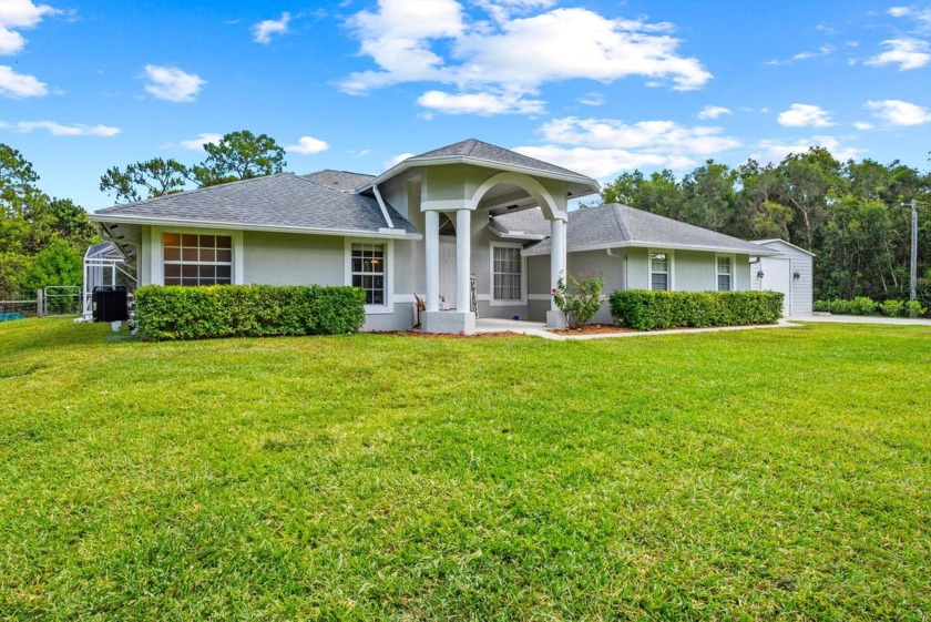 PAVED ROAD COMING SOON! Built for family living & weekend fun - Beach Home for sale in West Palm Beach, Florida on Beachhouse.com