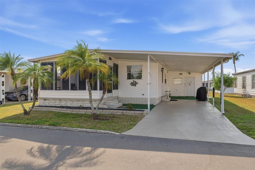 Welcome to 2107 Wailua Dr., located in the desirable Lake Conley - Beach Home for sale in Holiday, Florida on Beachhouse.com