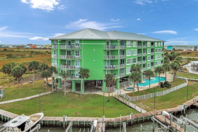 Rare Waterfront Gem in Navy Cove!. Live the ultimate coastal - Beach Condo for sale in Gulf Shores, Alabama on Beachhouse.com