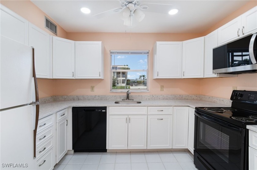 This charming Gulf Access, first-floor end unit is ready for its - Beach Condo for sale in Cape Coral, Florida on Beachhouse.com