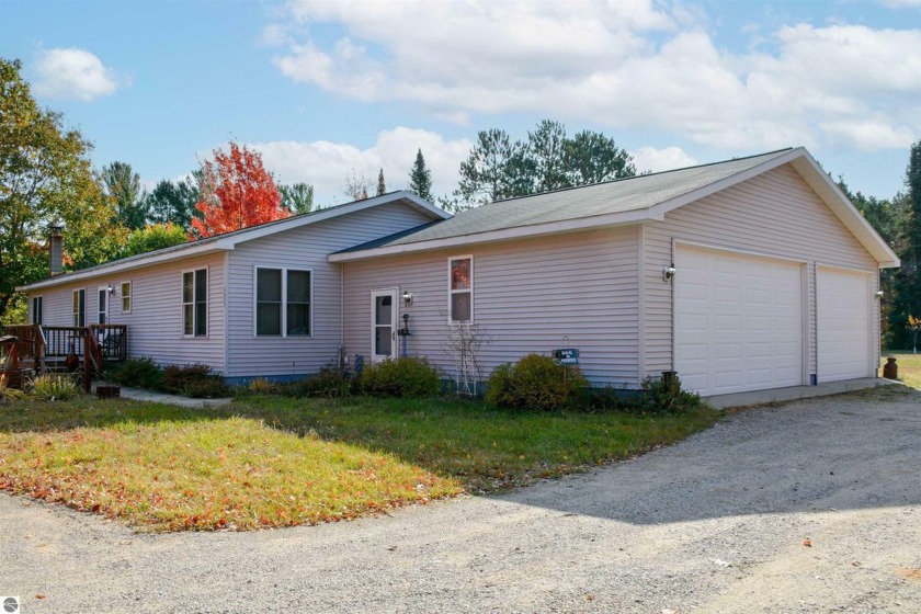 Experience the perfect blend of charm and convenience in this - Beach Home for sale in Traverse City, Michigan on Beachhouse.com