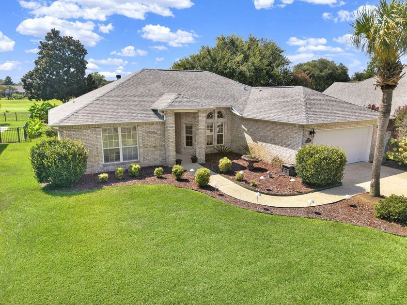 Welcome to this 1,876 sq. ft. all-brick home nestled along the - Beach Home for sale in Navarre, Florida on Beachhouse.com