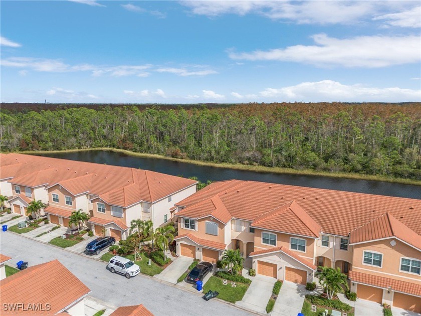 Discover luxury living with serene lake-to-preserve views in - Beach Townhome/Townhouse for sale in Fort Myers, Florida on Beachhouse.com