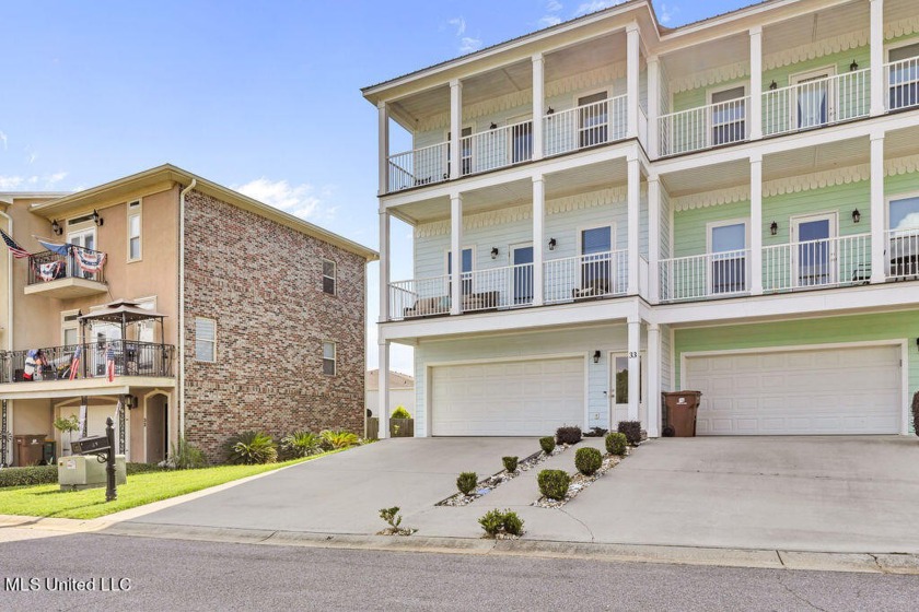 This one has an elevator to ALL floors! Sold fully furnished - Beach Townhome/Townhouse for sale in Long Beach, Mississippi on Beachhouse.com