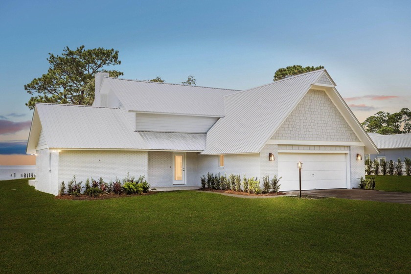 Set on the shores of Choctawhatchee Bay, this beautifully - Beach Home for sale in Freeport, Florida on Beachhouse.com