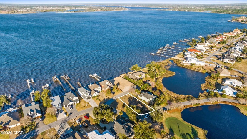 A rare opportunity awaits in Panama Country Club - the ONLY - Beach Lot for sale in Lynn Haven, Florida on Beachhouse.com