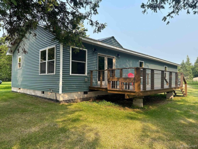 Lake Michigan Waterfront Getaway! Enjoy 100 feet of stunning - Beach Home for sale in Rapid River, Michigan on Beachhouse.com
