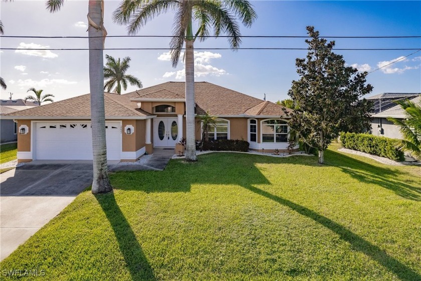 Pride of ownership shows in this beautiful Gulf Access 3/2/2 - Beach Home for sale in Cape Coral, Florida on Beachhouse.com