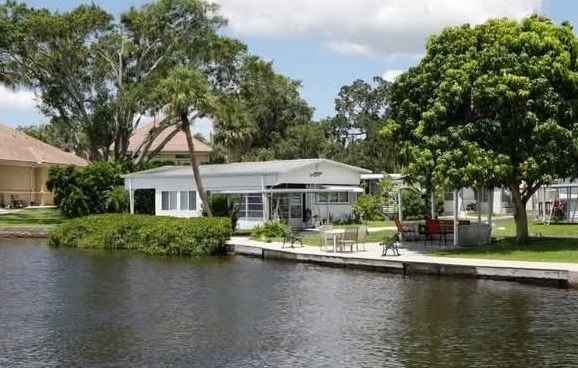 Waterfront Gem with Million-Dollar Views in Pelican Pier West - Beach Home for sale in Ellenton, Florida on Beachhouse.com