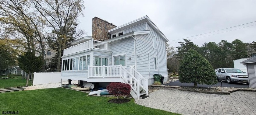 Welcome to Your Riverfront Oasis! Immerse yourself in - Beach Home for sale in Egg Harbor Township, New Jersey on Beachhouse.com