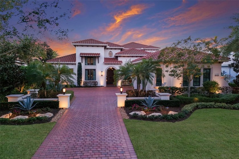 Situated behind the gates of The Lake Club in The Vineyards at - Beach Home for sale in Lakewood Ranch, Florida on Beachhouse.com