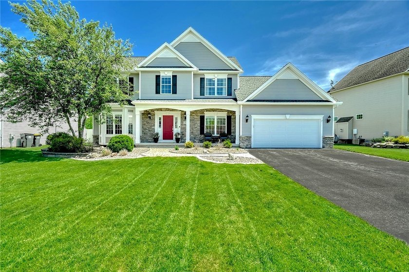WOW FACTOR!! Beautifully maintained 4-5 bedroom Colonial that - Beach Home for sale in Greece, New York on Beachhouse.com