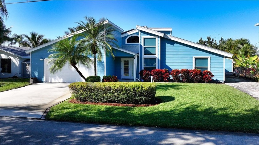 This coastal 3-bedroom, 2.5-bath home with a loft and 2-car - Beach Home for sale in Palm City, Florida on Beachhouse.com