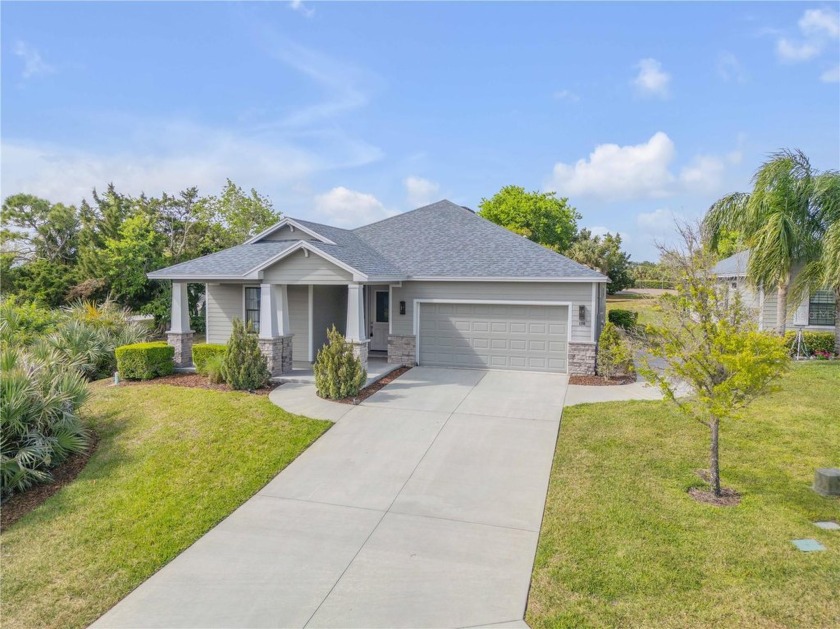 Located in the highly sought-after gated golf community of Sugar - Beach Home for sale in New Smyrna Beach, Florida on Beachhouse.com