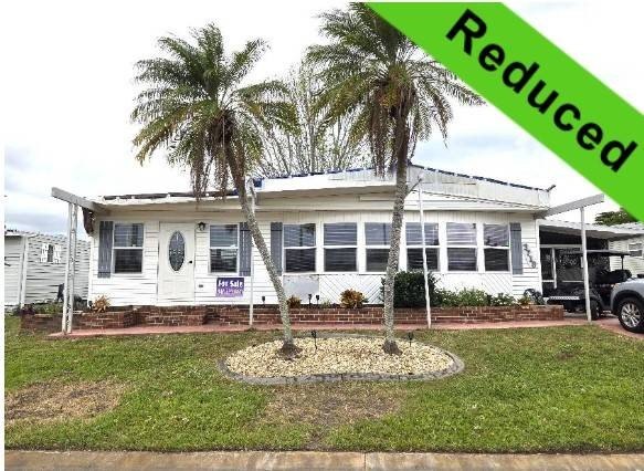 This beautifully updated home is brimming with charm and modern - Beach Home for sale in Ellenton, Florida on Beachhouse.com