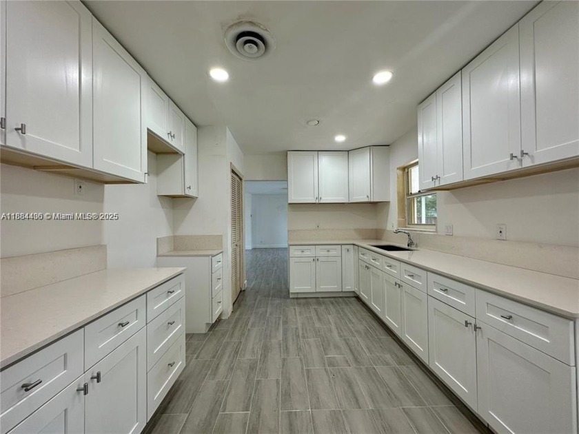 Beautiful 3/2 pool home with 2-car garage. Features an updated - Beach Home for sale in Pompano Beach, Florida on Beachhouse.com