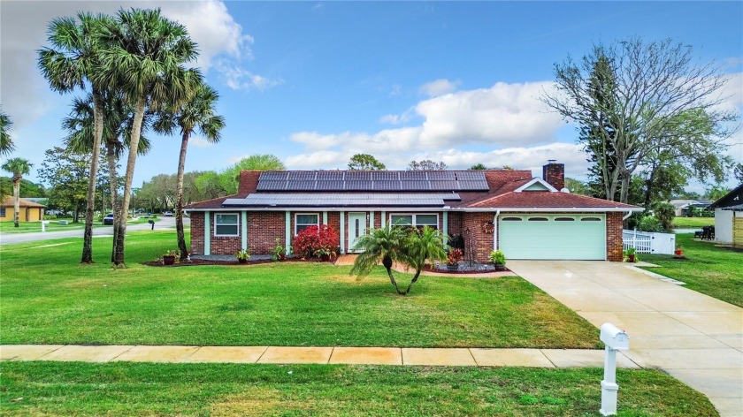 This absolutely lovely brick home has been meticulously cared - Beach Home for sale in Port Orange, Florida on Beachhouse.com