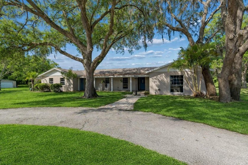Located in the highly sought after Golden Acres community, this - Beach Home for sale in New Port Richey, Florida on Beachhouse.com