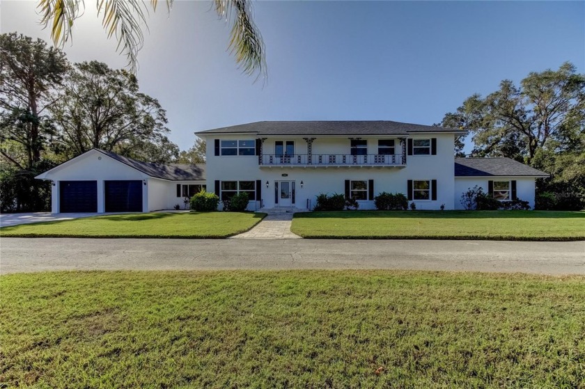 The adjacent lot (MLS# TB8389567) will be sold either in - Beach Home for sale in Dunedin, Florida on Beachhouse.com
