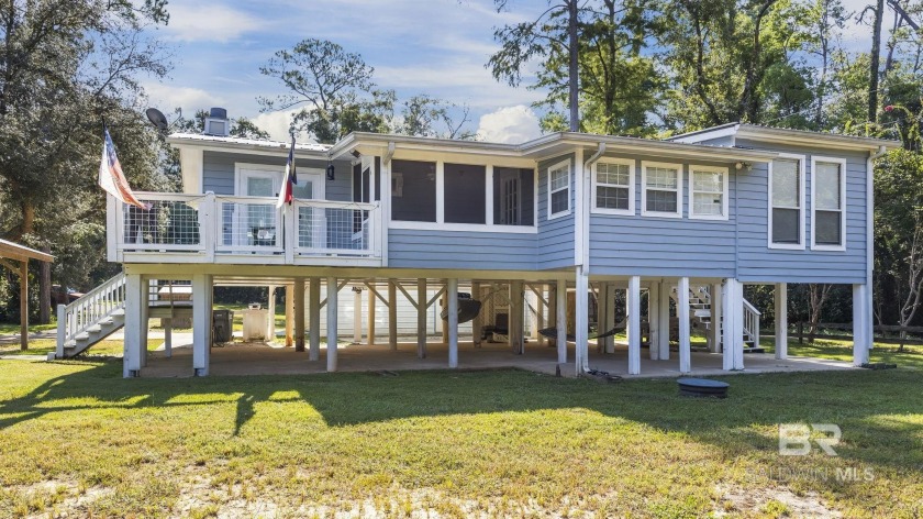 Welcome to your private retreat on beautiful Fish River! This - Beach Home for sale in Silverhill, Alabama on Beachhouse.com