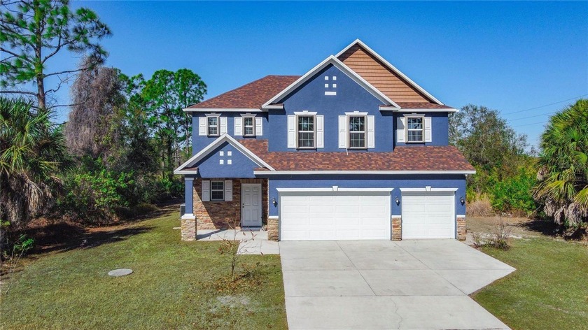 Discover over 3,200 sq.ft. of private living on a rare double - Beach Home for sale in Port Charlotte, Florida on Beachhouse.com