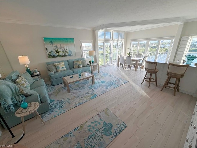 This stunning top floor, end-unit WATERFRONT Penthouse boasts 3 - Beach Condo for sale in Bonita Springs, Florida on Beachhouse.com