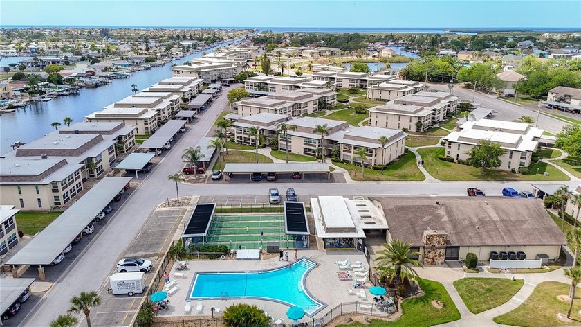 Welcome to 5111 Amulet Drive, Unit B105, a spacious and - Beach Condo for sale in New Port Richey, Florida on Beachhouse.com