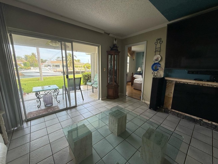 Experience contemporary coastal living in this exquisite first - Beach Condo for sale in Riviera Beach, Florida on Beachhouse.com