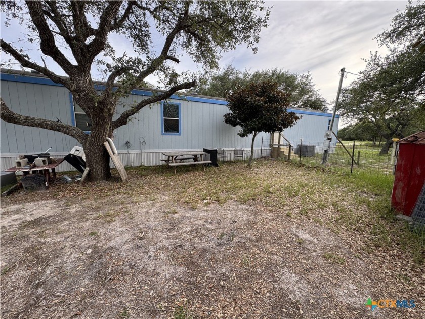 Discover a charming manufactured home nestled on a mature - Beach Home for sale in Rockport, Texas on Beachhouse.com