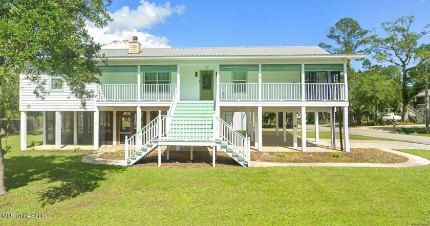 Welcome to this home nestled on a spacious corner lot in Timber - Beach Home for sale in Pass Christian, Mississippi on Beachhouse.com