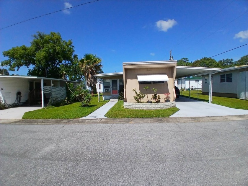 1965 single-wide mobile home located in Delightful, Dunedin - Beach Home for sale in Dunedin, Florida on Beachhouse.com