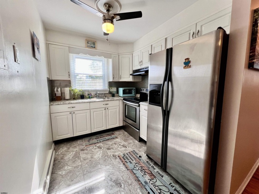 Welcome to your perfect summer getaway at 14 N Sacramento Ave in - Beach Condo for sale in Ventnor, New Jersey on Beachhouse.com