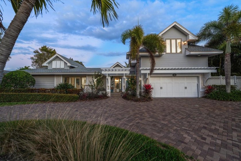 Perfectly poised in the highly sought-after Harbor Bluffs, this - Beach Home for sale in Largo, Florida on Beachhouse.com