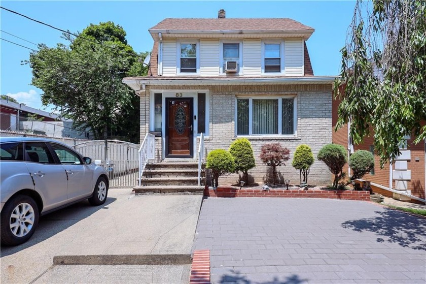 Welcome to this charming detached single-family home in the - Beach Home for sale in Staten  Island, New York on Beachhouse.com