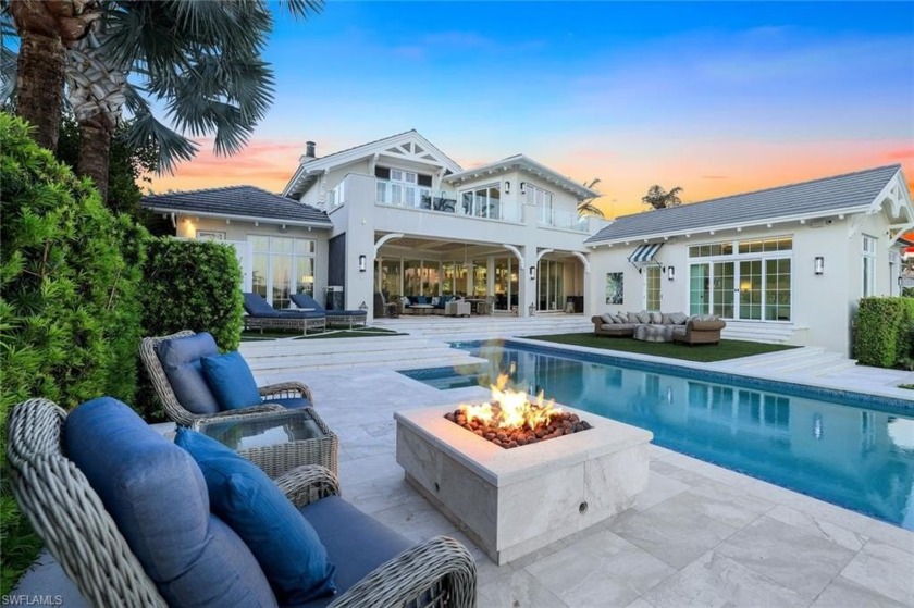 Live in casual elegance in this beautiful custom waterfront two - Beach Home for sale in Naples, Florida on Beachhouse.com