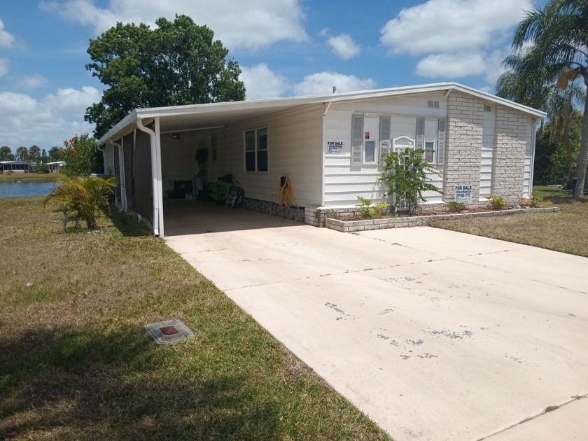 **STUNNING LAKE HOME WAITING FOR YOU TO CALL HOME** Located in - Beach Home for sale in Vero Beach, Florida on Beachhouse.com
