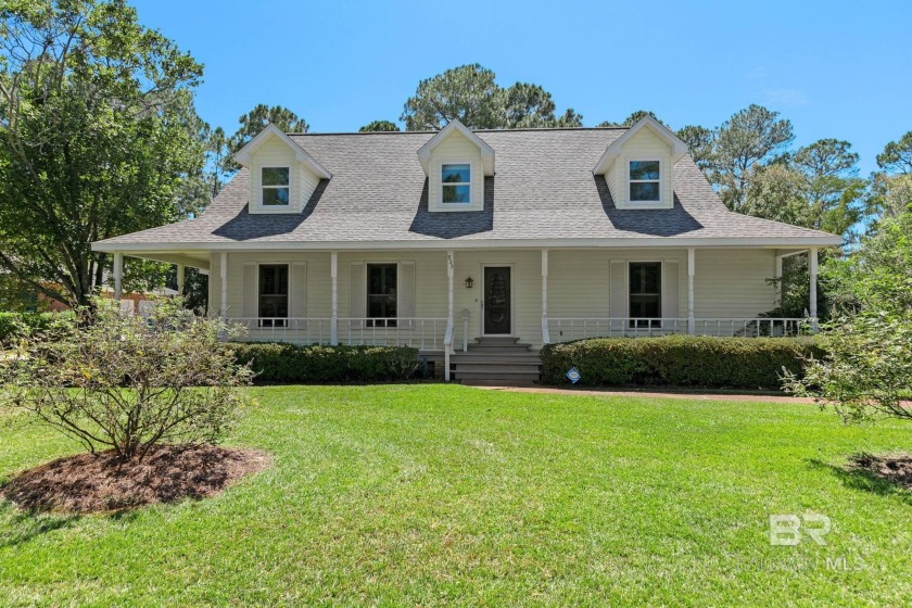 Welcome to this 3-bedroom, 2.5-bath Creole-style home located in - Beach Home for sale in Gulf Shores, Alabama on Beachhouse.com