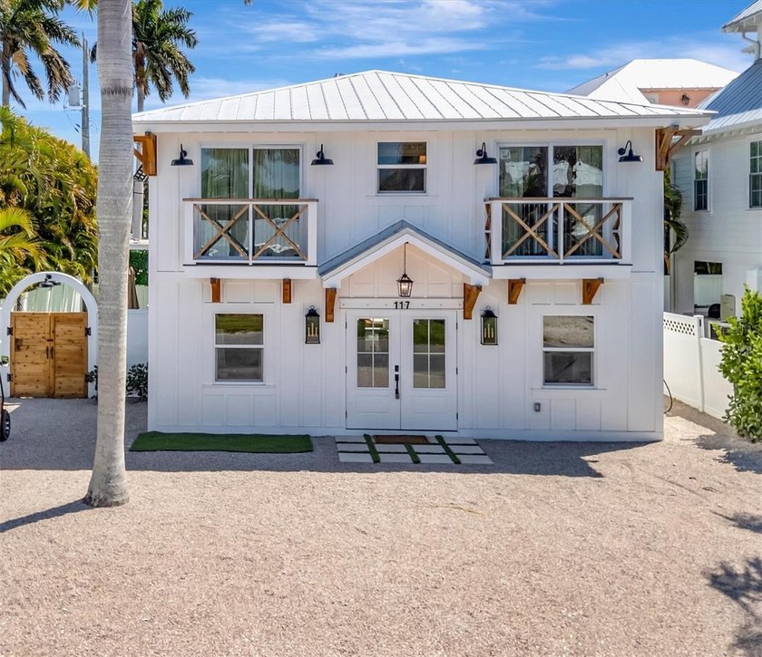 Welcome to 117 81st Street in Holmes Beach, a custom-designed - Beach Home for sale in Holmes Beach, Florida on Beachhouse.com
