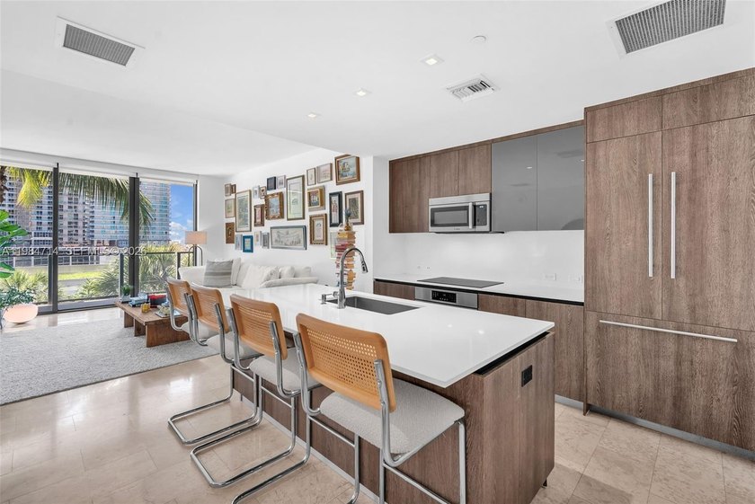 This beautifully appointed residence boasts an open-concept - Beach Condo for sale in Miami, Florida on Beachhouse.com