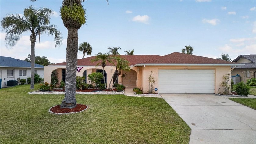 Welcome to your waterfront dream home in the highly desirable - Beach Home for sale in New Port Richey, Florida on Beachhouse.com