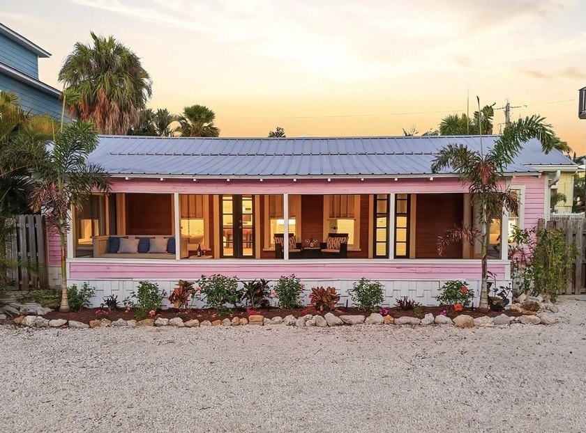 You must see this charming 1940s Craftsman cottage tucked into - Beach Home for sale in Holmes Beach, Florida on Beachhouse.com