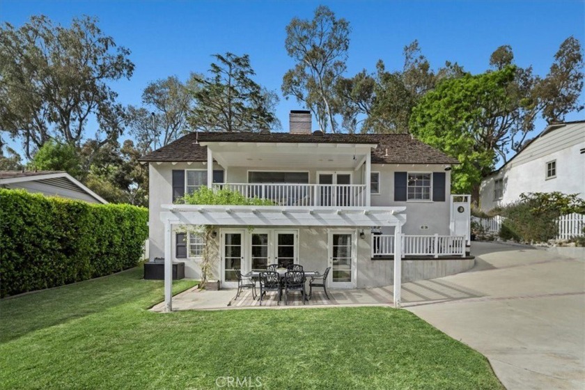 Welcome to this charming residence nestled behind a white picket - Beach Home for sale in Palos Verdes Estates, California on Beachhouse.com