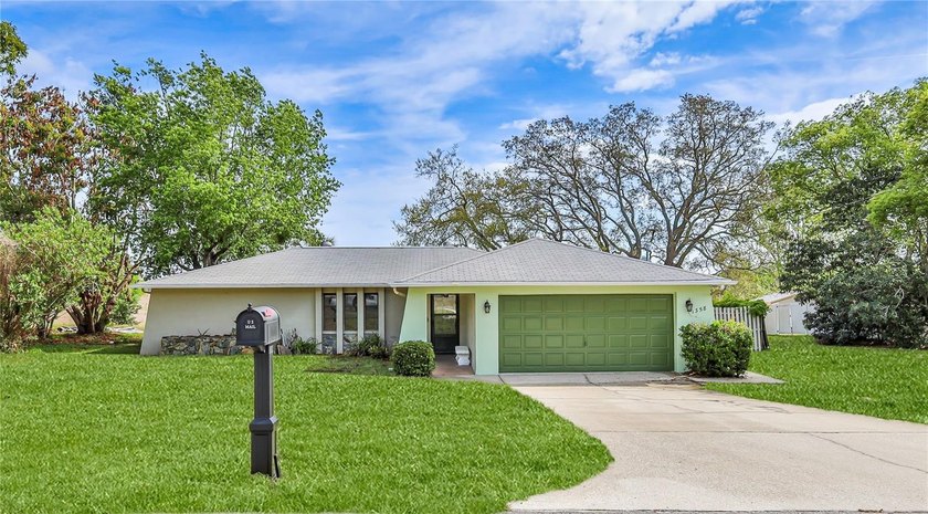 Fantastic location on .34 acres! NEW ROOF Coming soon! NEW AC - Beach Home for sale in Spring Hill, Florida on Beachhouse.com