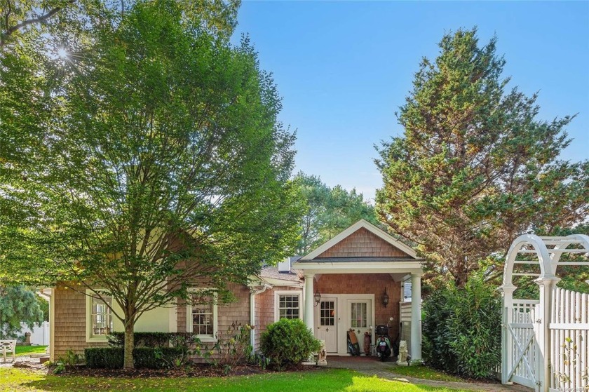 This Nantucket-style cedar-shake cape in Quiogue offers a blend - Beach Home for sale in Southampton, New York on Beachhouse.com