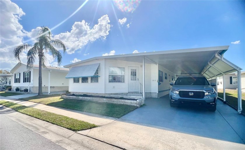 Enjoy easy Florida living in this light, bright, and beautifully - Beach Home for sale in Largo, Florida on Beachhouse.com