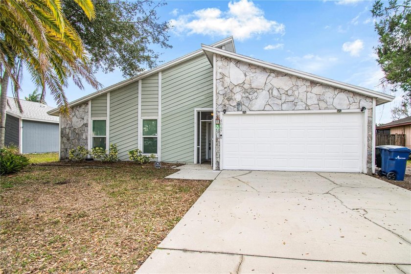 Welcome to this stylish 3-bedroom, 2-bath, 2-car garage POOL - Beach Home for sale in Sarasota, Florida on Beachhouse.com