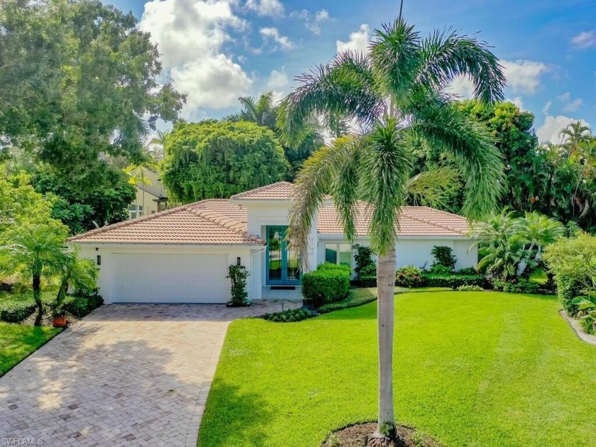 Discover this updated 3-bedroom plus den pool home, nestled on a - Beach Home for sale in Naples, Florida on Beachhouse.com