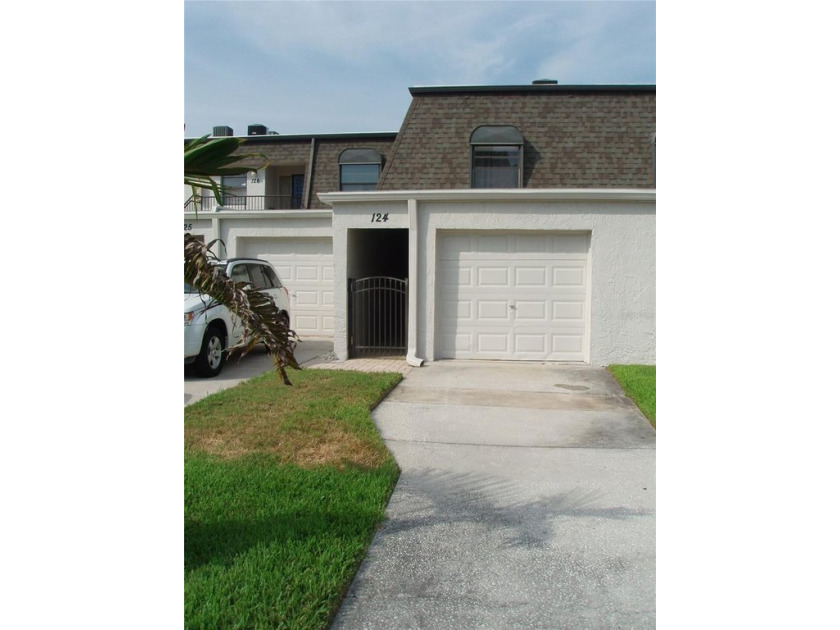 2 bedroom 2 and one half bath 2 story waterfront unit in Caribay - Beach Condo for sale in Clearwater, Florida on Beachhouse.com