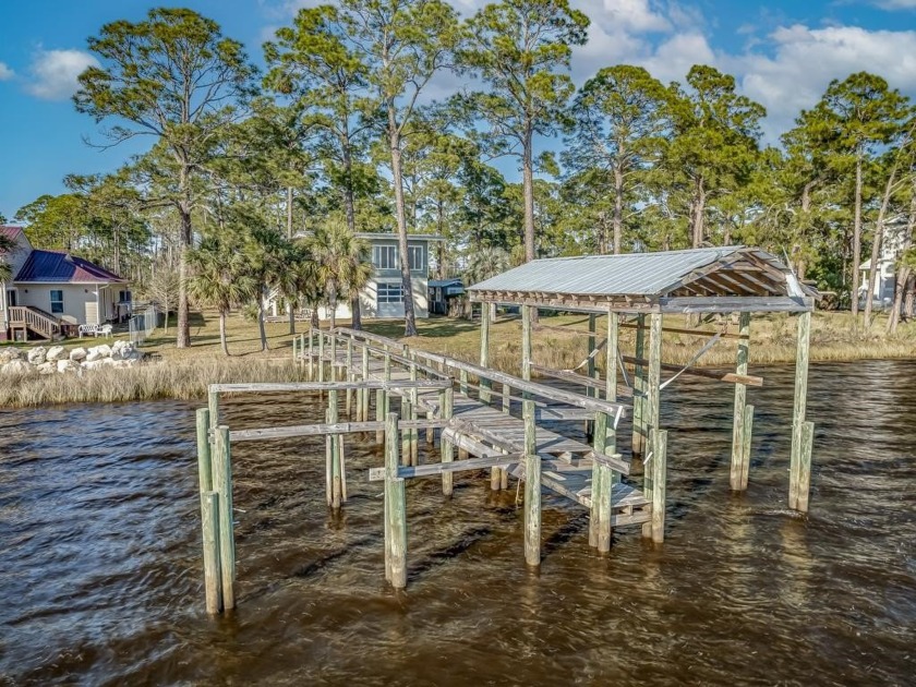 This house is an amazing waterfront fishing and boating getaway - Beach Home for sale in Ochlockonee Bay, Florida on Beachhouse.com