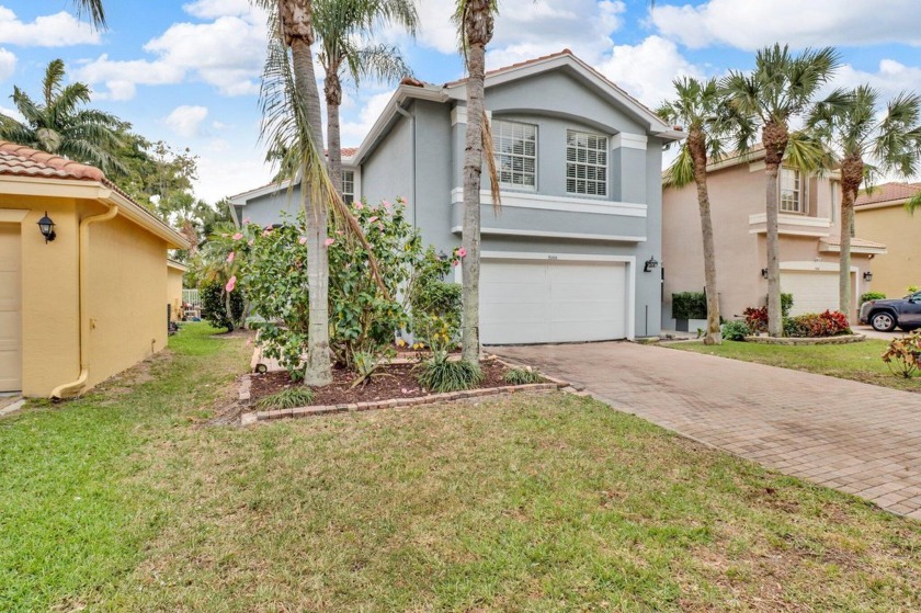 Welcome to your new home nestled in the gated community of - Beach Home for sale in Greenacres, Florida on Beachhouse.com